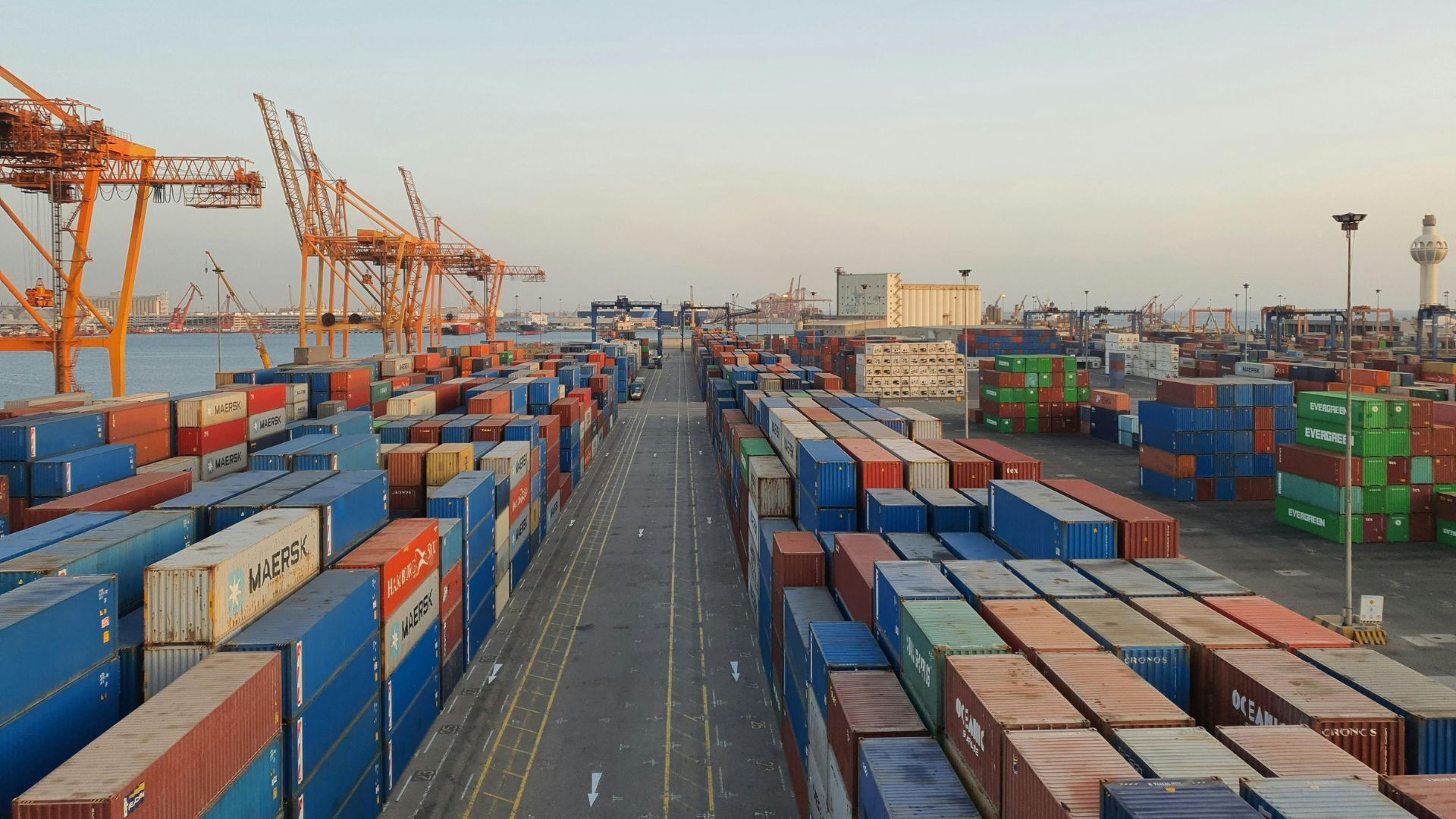 Shipping containers stacked at the port.