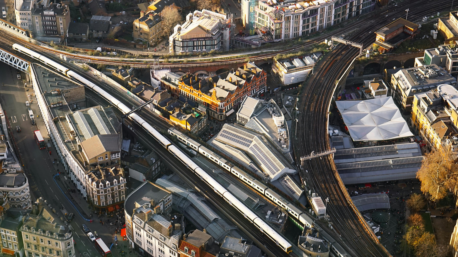 Aerial view of London rail network and trains in central London.